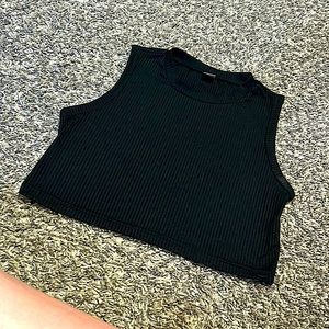 I’m selling a black crop top that I bought machine for my daughter wore it once.